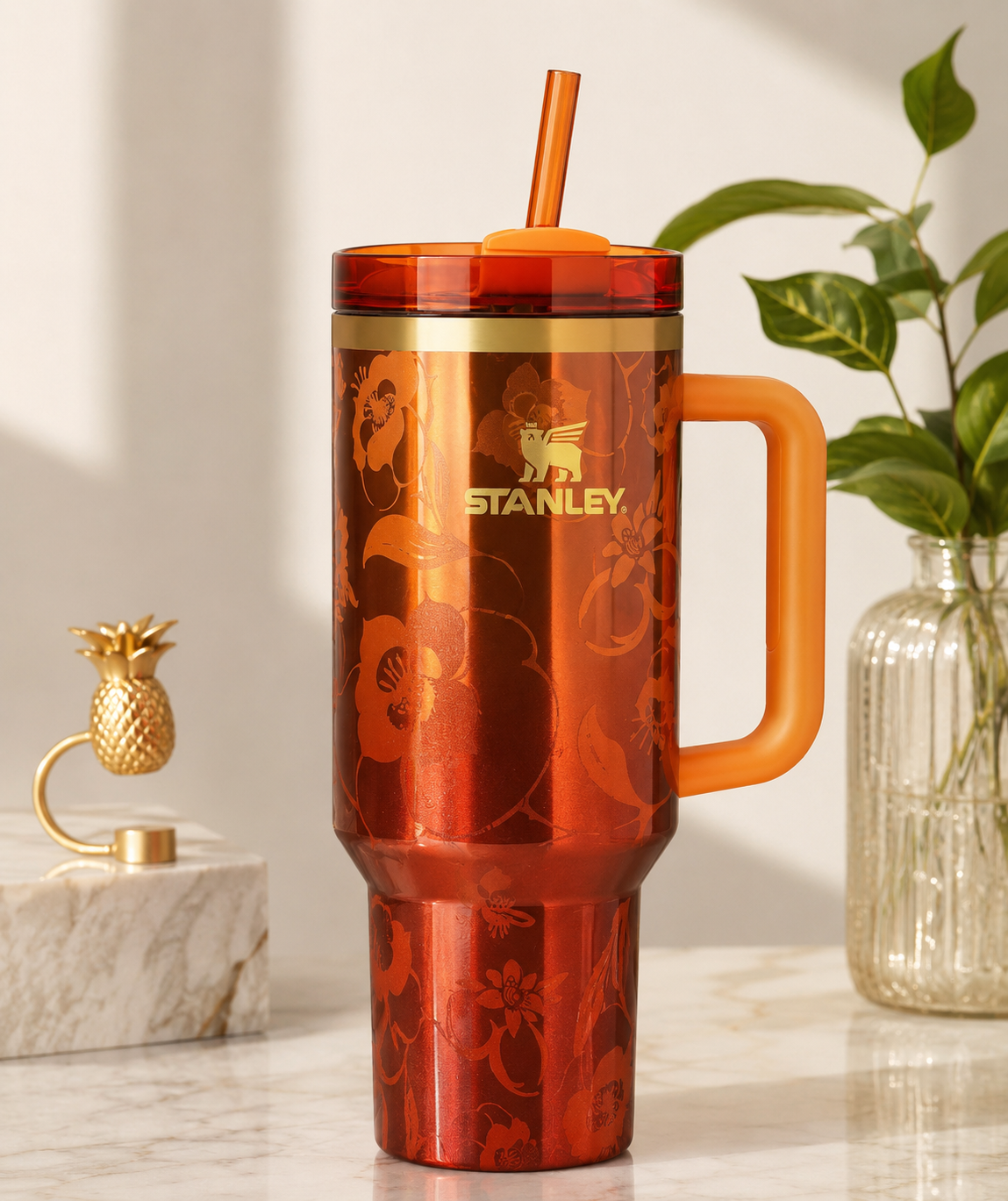 The Stanley 1913 x KAROL G 40 oz Quencher H2.O FlowState Tumbler