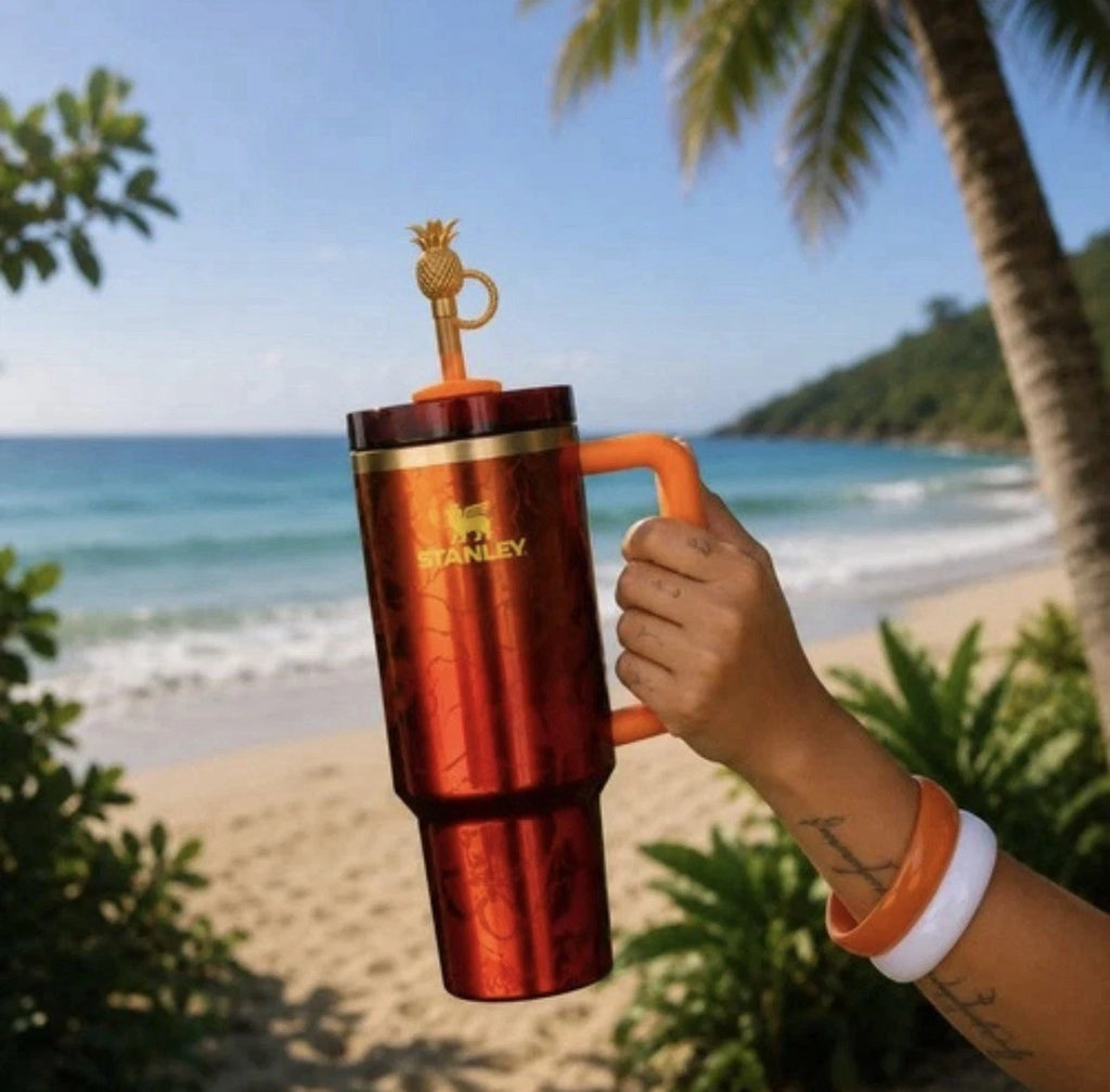 The Stanley 1913 x KAROL G 40 oz Quencher H2.O FlowState Tumbler