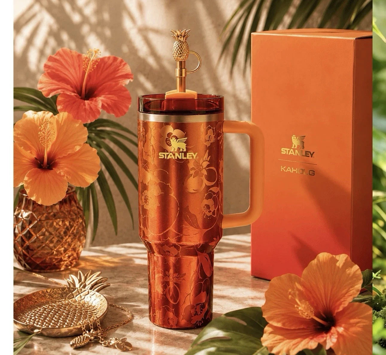 The Stanley 1913 x KAROL G 40 oz Quencher H2.O FlowState Tumbler